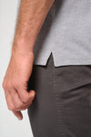Polo unissexo eco-responsável com bolso no peito